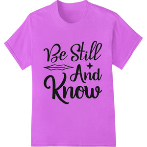 Inspirational 'Be Still And Know' text design in black lettering on a white background, suitable for DTF heat transfers.